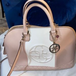 Guess handbag roomy and a great color for spring!used once